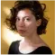 Portrait of a woman in a black shirt.